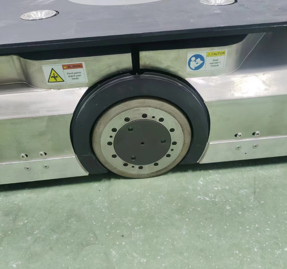 Electric monorail system wheels for food processing