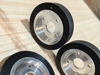Improving Pallet Shuttle Car System Reliability in Cold Storage: A Polyurethane Wheel Solution